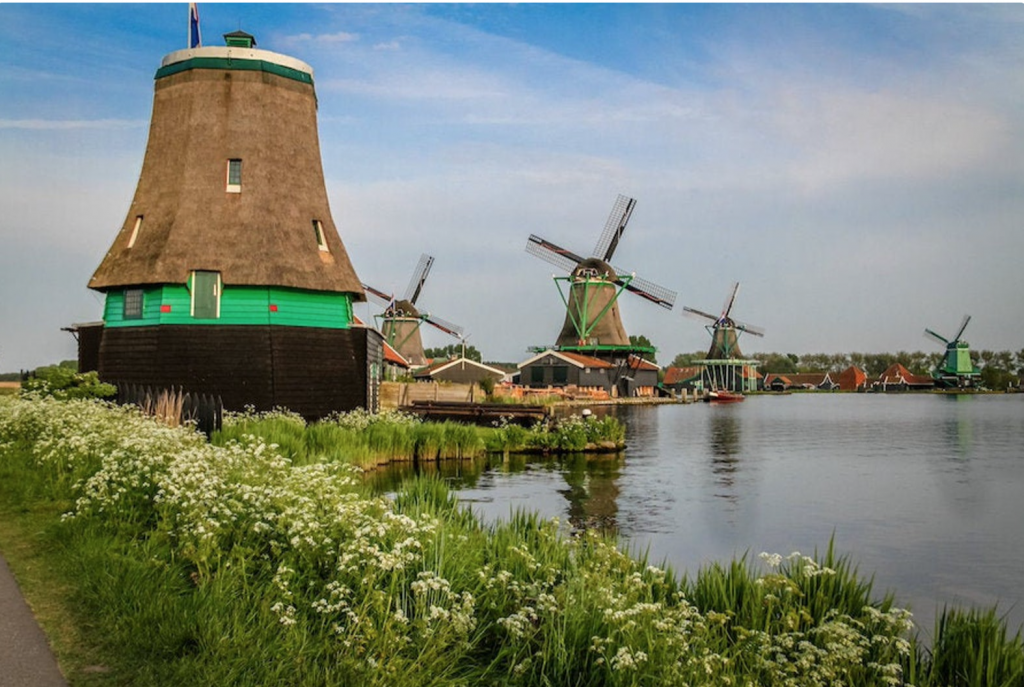 Falling Off Bicycles, Julia Willard, Amsterdam, windmill, boat on a canal, grachten, Amsterdam photography