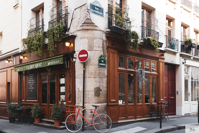 Bike parked at the corner of Parisian streets