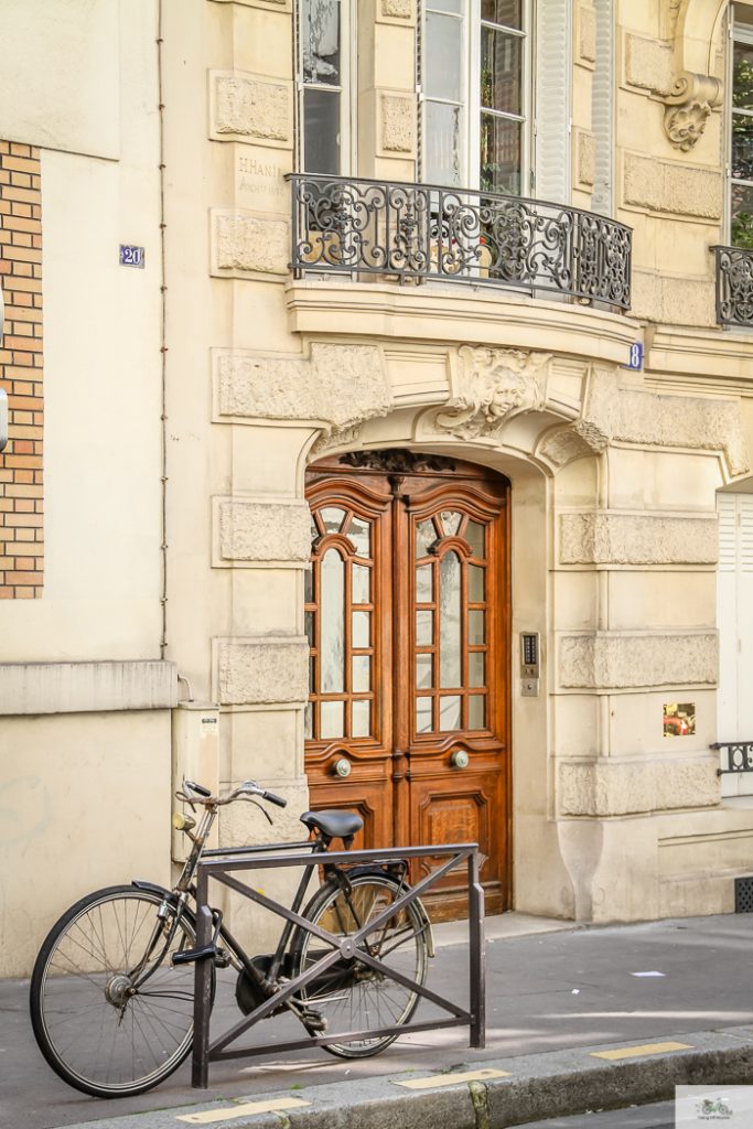 Bike parked outside of French building