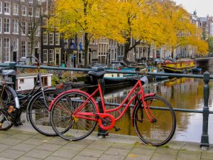 Julia Willard, Julie Willard, Falling Off Bicycles, Paris, Paris photographer, Amsterdam photographer, Fall in Amsterdam, red bike, Amsterdam canal, Brouwersgracht