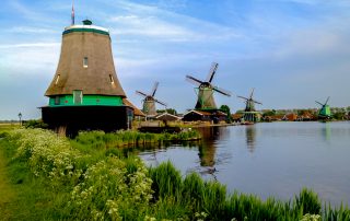 Julia Willard, Julie Willard, Julia Arias, Dutch windmills, windmills, Falling Off Bicycles, cycle Holland, biking Amsterdam, Amsterdam day trip, Spring in Holland, Netherlands spring,Zaanse Schans